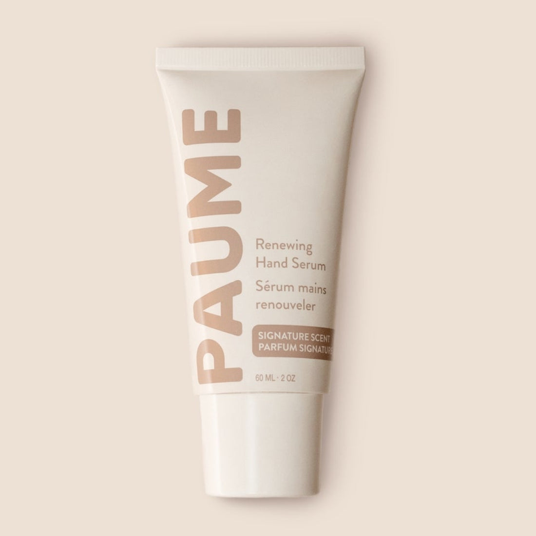 PAUME hand serum tube on a beige background