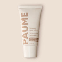 PAUME hand serum tube on a beige background