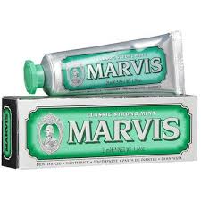 Two tubes of Marvis toothpaste on a white background