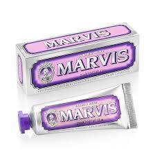 Two tubes of Marvis toothpaste on a white background