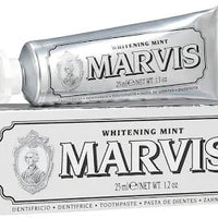 Marvis Whitening Mint toothpaste tube on a white background